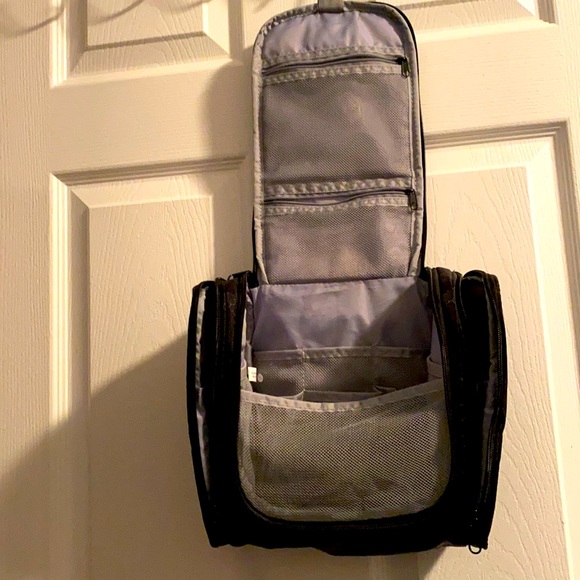 Other - Small black travel toiletry bag. Hook on top for hanging up.